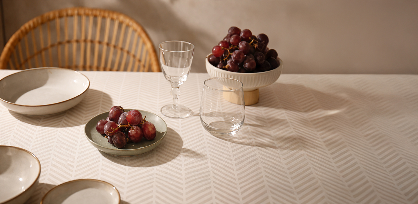 Primolino geometric textile pattern developed for tablecloths and surface applications.