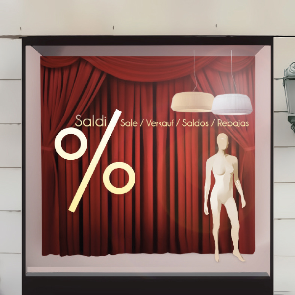 Summer showcase window with seasonal props, mannequins and bright decorative accents.